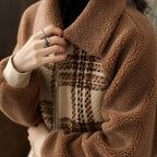 Model wearing Baltere's Women's Plaid Coat, showcasing its classic pattern, slimming fit, modern and warm design.