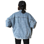 Rear view of the Baltere Women's Retro Denim Jacket, highlighting its classic stitching and comfortable oversized fit.