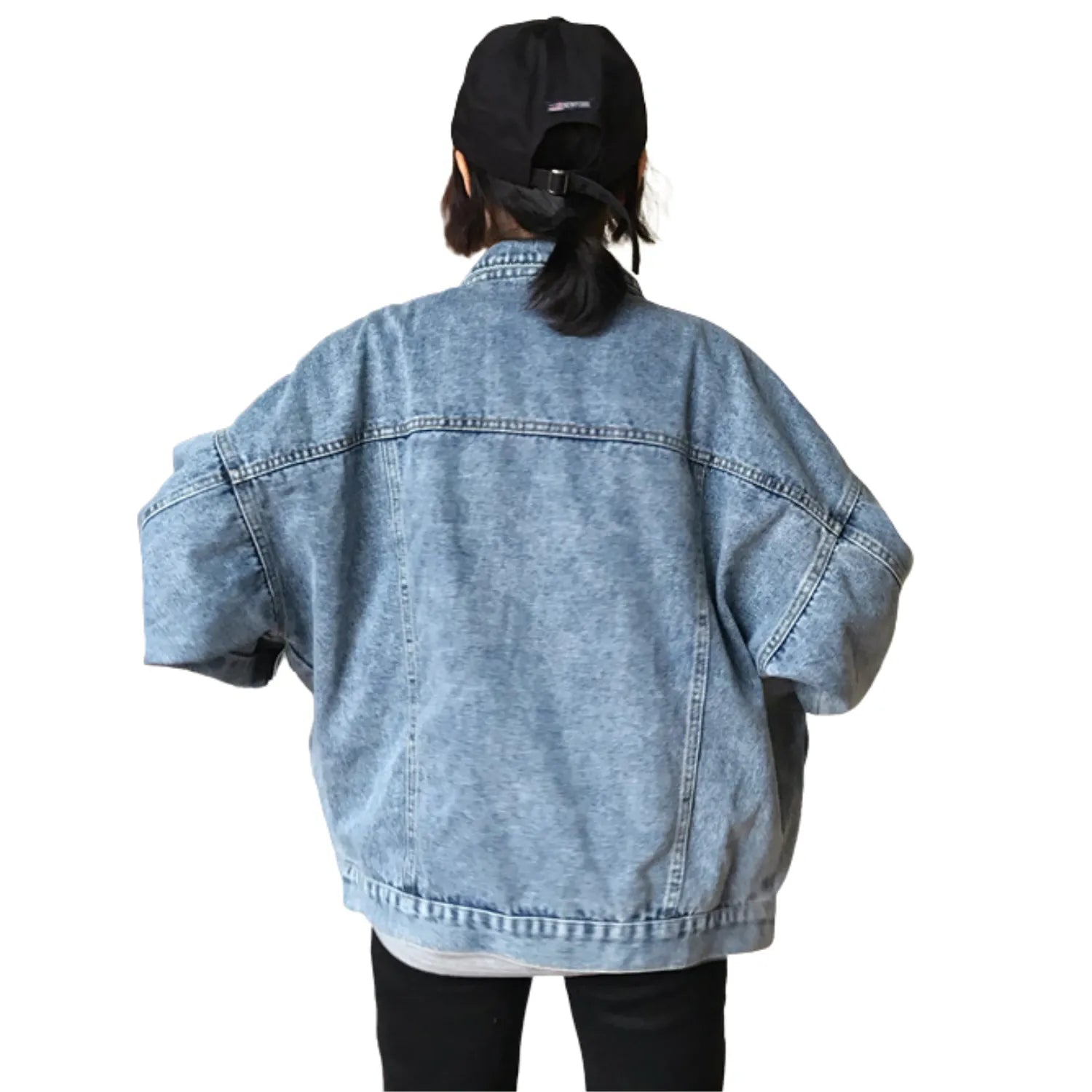 Rear view of the Baltere Women's Retro Denim Jacket, highlighting its classic stitching and comfortable oversized fit.