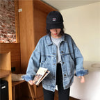 Baltere Women's Retro Denim Jacket blue, featuring a loose fit, button-up front, and four classic flap pockets.