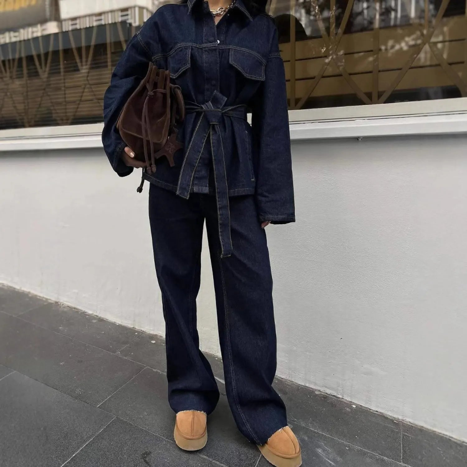 Model wearing Women's Retro Denim Jacket and Trousers Set, showcasing the matching denim ensemble.