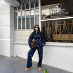 Model wearing Baltere's Women's Retro Denim Jacket and Trousers Set,  modern, showcasing the matching denim ensemble.