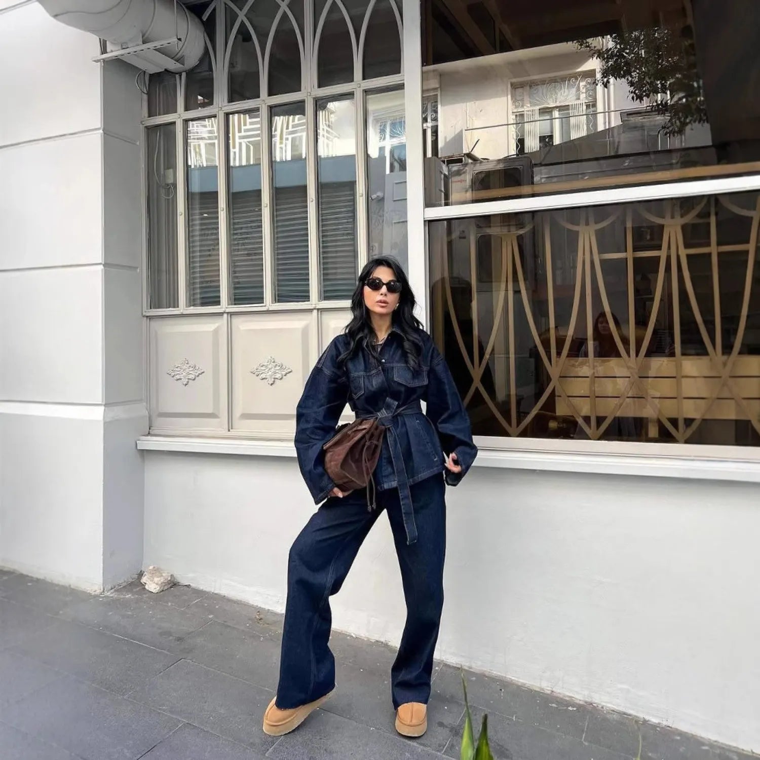 Model wearing Baltere's Women's Retro Denim Jacket and Trousers Set,  modern, showcasing the matching denim ensemble.
