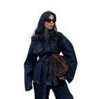 Model wearing Baltere's Women's Retro Denim Jacket and Trousers Set, showcasing the matching denim ensemble.