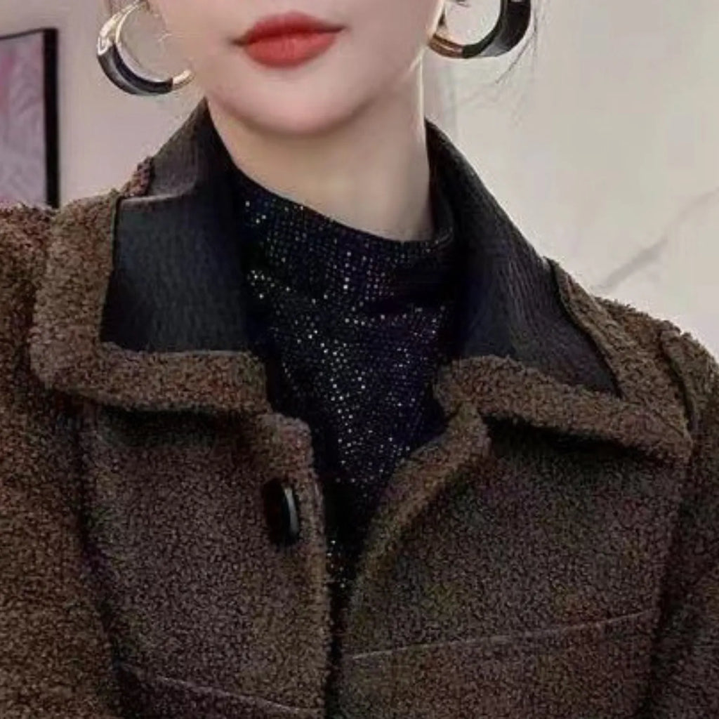 Model wearing Baltere's reversible leather jacket, showcasing its oversized collar, and modern silhouette.