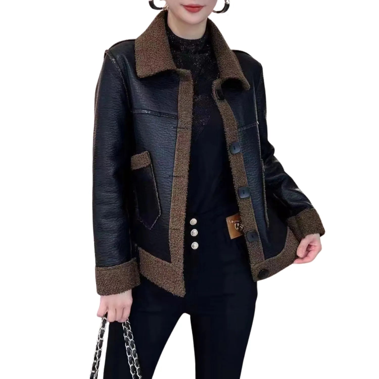 Model wearing Baltere's reversible leather jacket, showcasing its oversized collar, front buttons in black and brown.